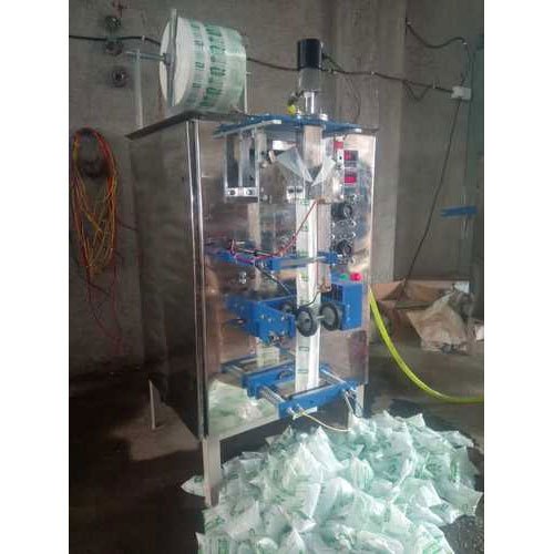 AUTOMATIC MILK POUCH PACKING MACHINE